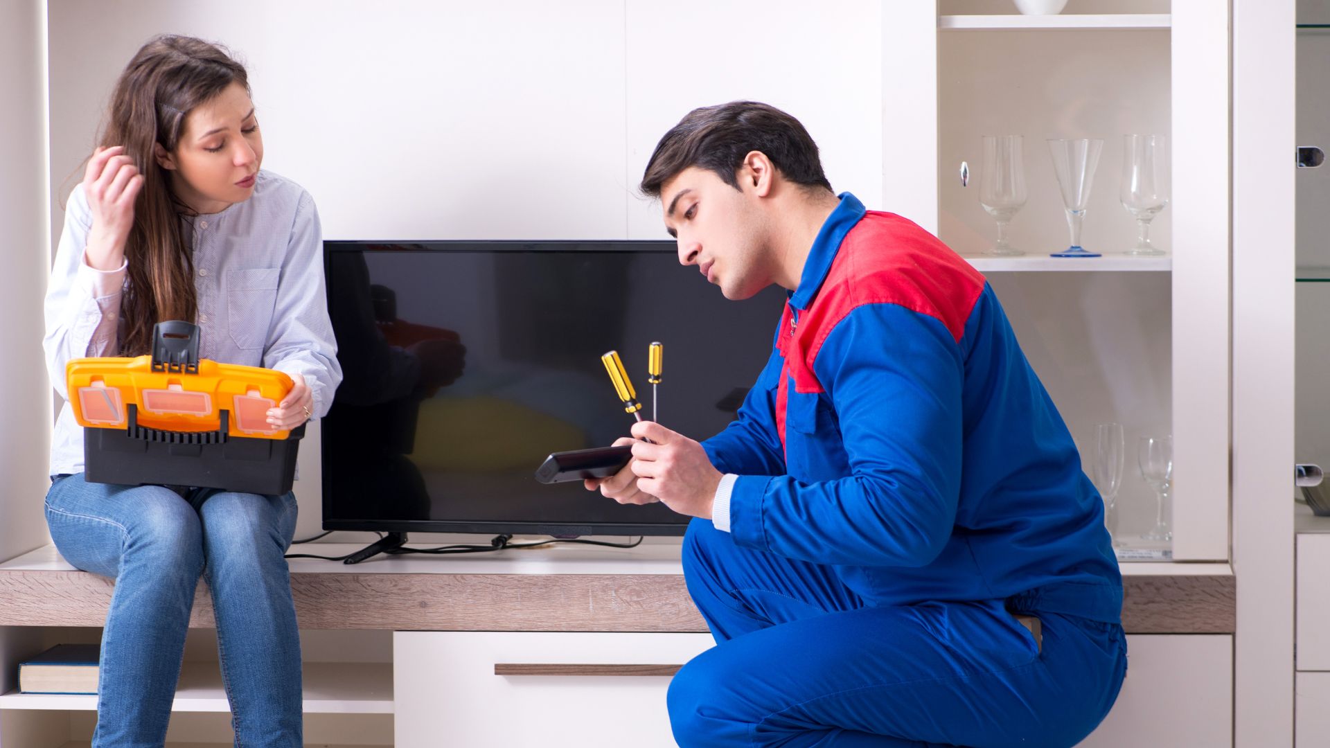 Tv Repairman Technician Repairing Tv at Home